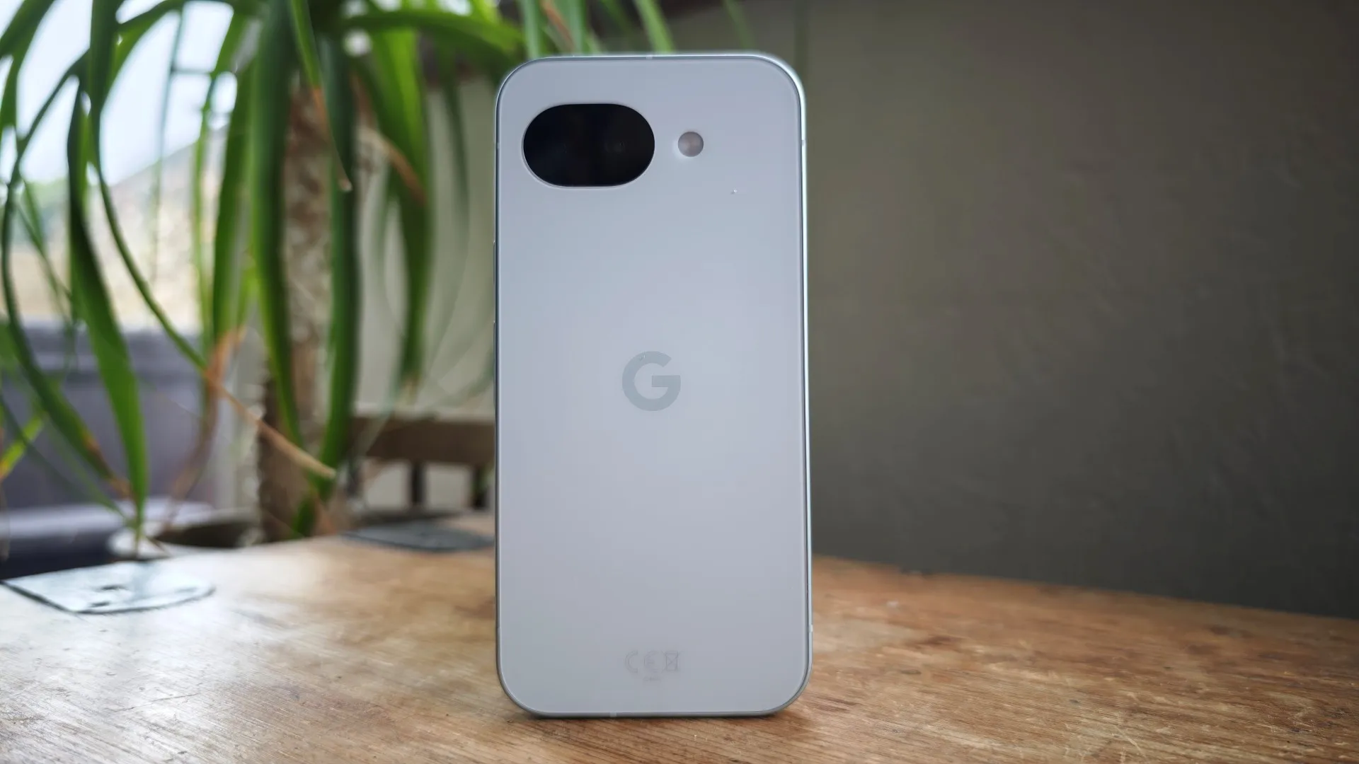 Render of the Google Pixel 11a showing its low‑profile camera and Orchid colour option